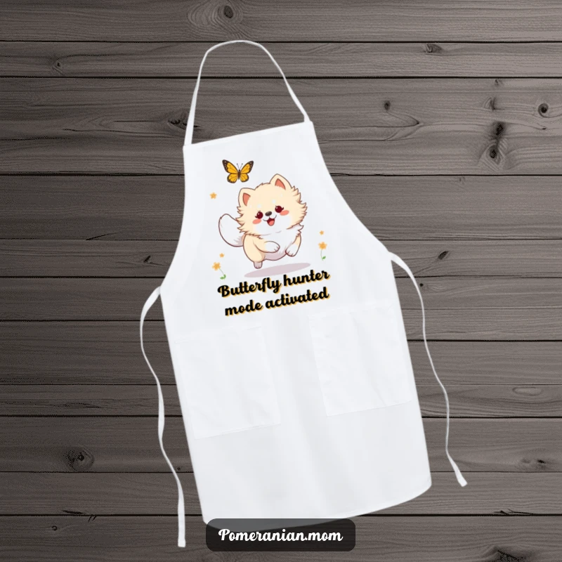 Funny Kawaii Pomeranian apron, a cute dog energetically chasing a butterfly while you cook, adding humor to meal prep.