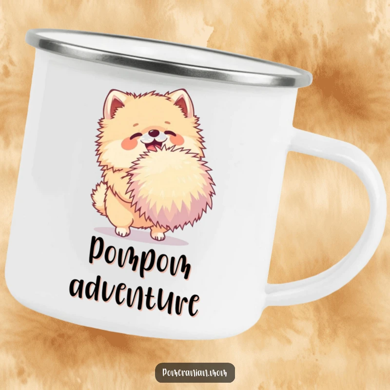 Funny Pomeranian camping mug with a joyful dog shaking a very large pom-pom, perfect for enjoying drinks outdoors.