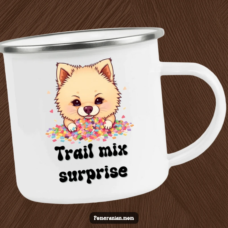 Funny Pomeranian camping mug with a dog happily diving into a massive heap of colorful confetti, ready for adventure.