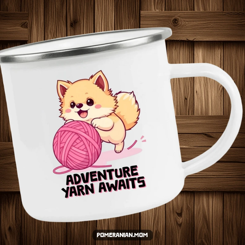 Funny Pomeranian camping mug, a fluffy dog hilariously chasing a giant yarn ball, ideal for outdoor enthusiasts.