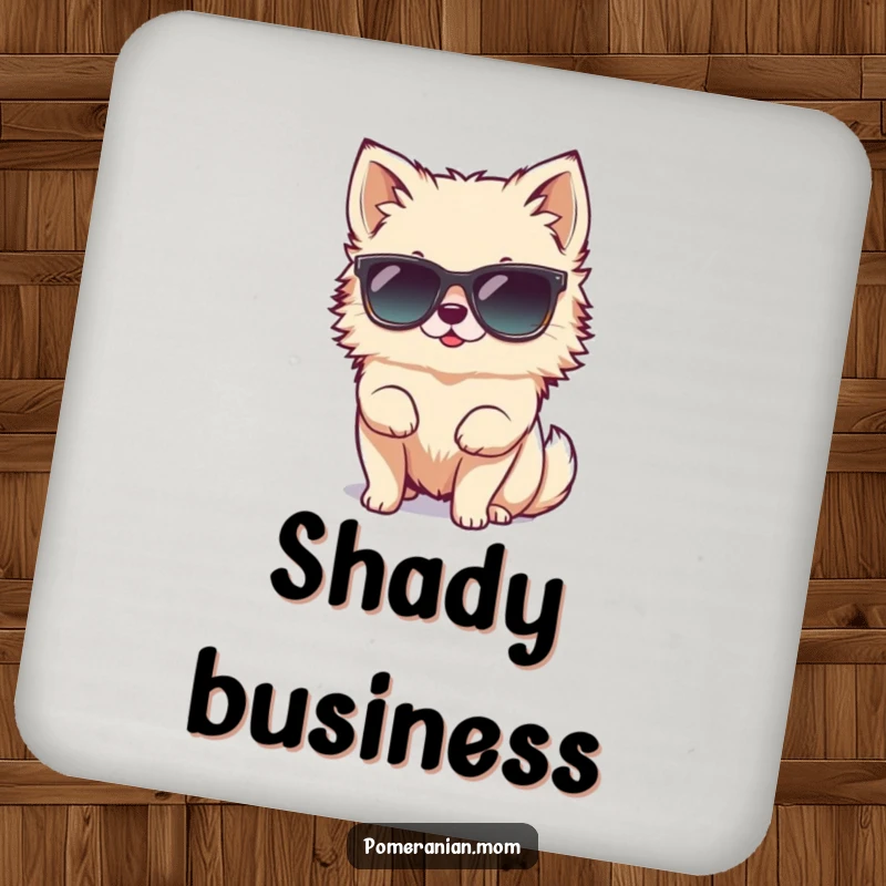 Funny tiny Pomeranian character hilariously attempting to wear oversized sunglasses on this protective drink coaster, adding a touch of cool humor.