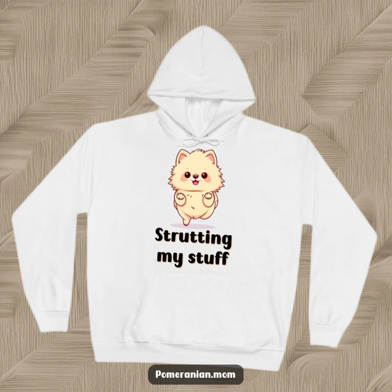 Funny kawaii Pomeranian hoodie, showing a fluffy dog gracefully prancing with delicate, tiny paws. Ideal for stylish comfort.