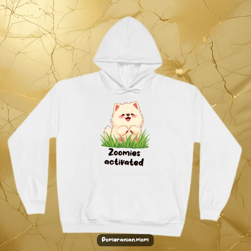 Funny Pomeranian hoodie featuring a charming kawaii dog joyfully rolling in lush green grass.