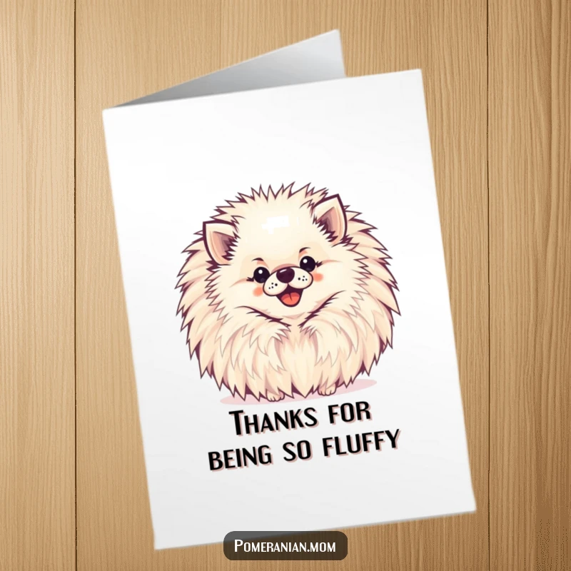 Funny Free Printable Pomeranian Thank You Card: A happy Pomeranian peeking from behind a pompom to say thank you.