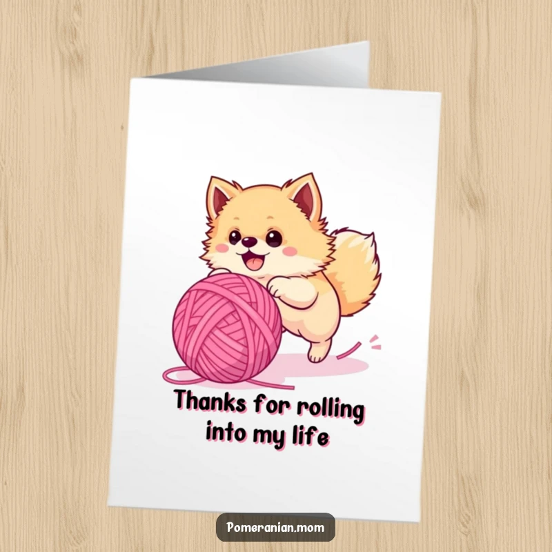 Funny Free Printable Thank You Card: Adorable Pomeranian dog mid-chase with a huge ball of yarn, expressing thanks.