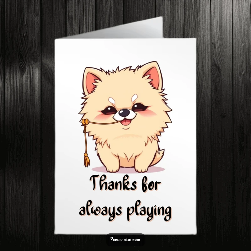 Funny Free Printable Kawaii Pomeranian thank you card, mischievous grin, batting at a string, cute gratitude.
