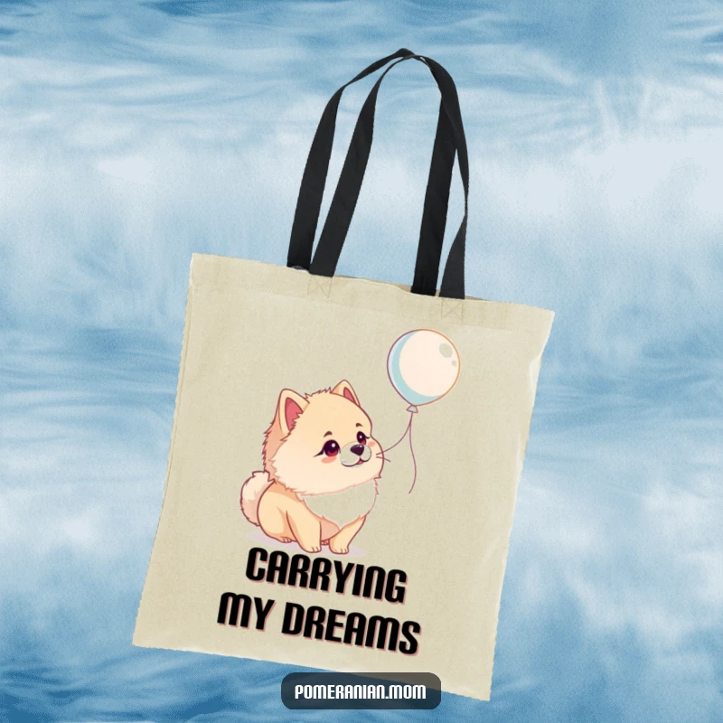 Funny Pomeranian tote bag showing a dog looking at a balloon with wonder, a cute and humorous accessory for dog lovers.